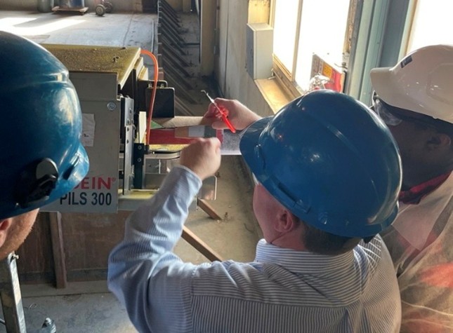 Workplace Experimenting and Visual Thinking Together at Helena Industries. -